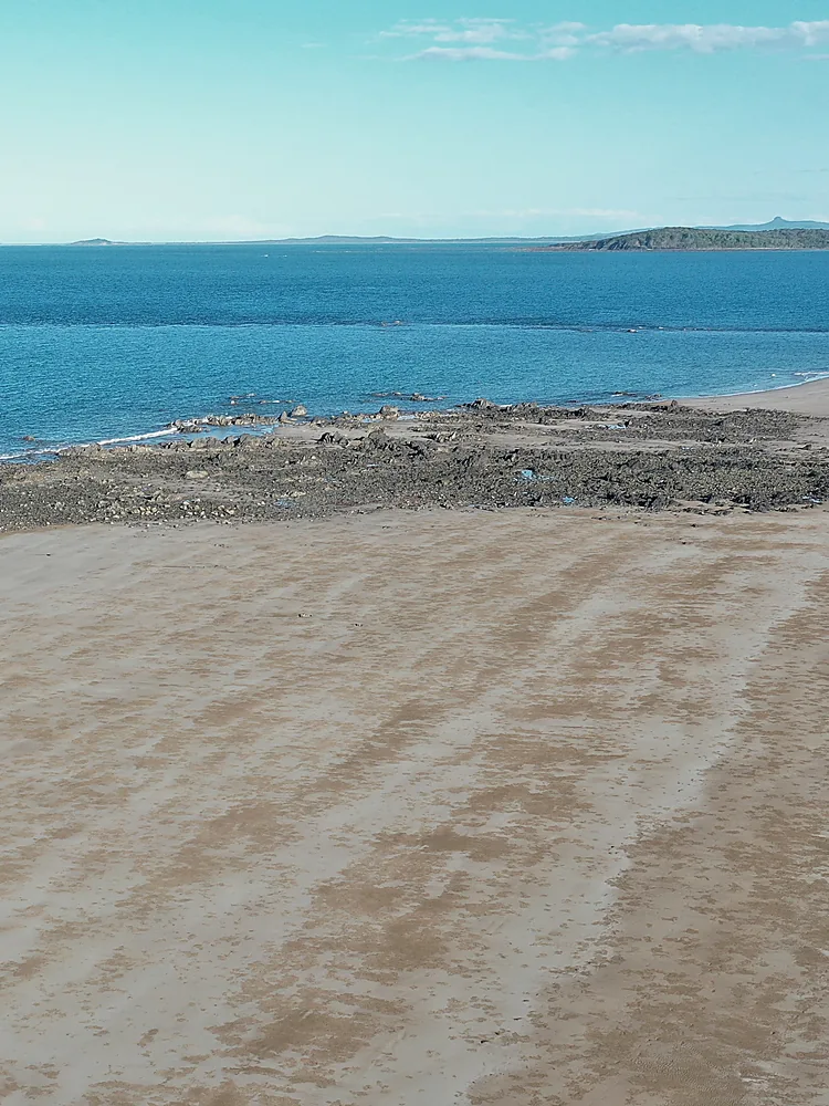 Aerial view of Campwin Beach, Sarina — Kulhavn home waters, Queensland