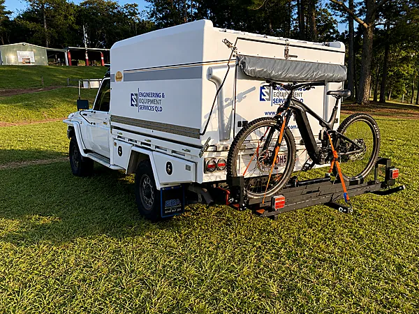 E-MTB mounted on the rear carrier of the 79 Series, powered by EES QLD